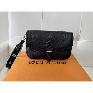 Louis Vuitton Black Embossed Leather Clutch